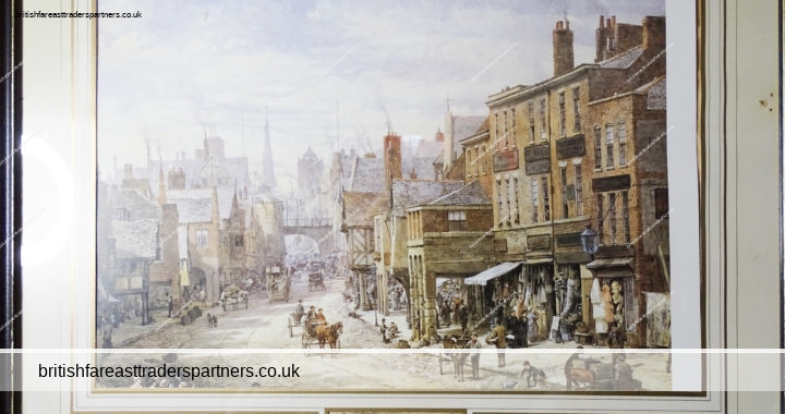 VINTAGE FRAMED PRINT OF AN EARLY ENGLISH TOWN SCENE FEATURING HORSE-DRAWN CARRIAGES, SHOPS, PERIOD FASHION, AND PEOPLE GOING ABOUT THEIR DAILY BUSINESS